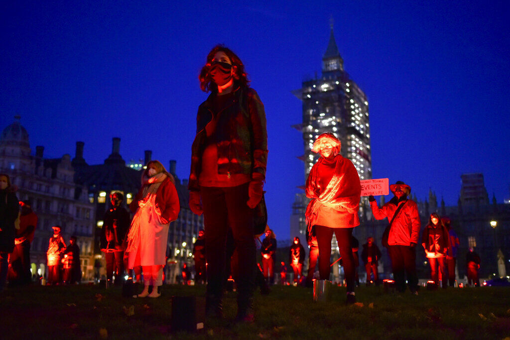 APTOPIX Virus Outbreak Britain Protest
